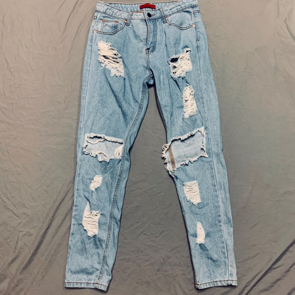 Distressed denim jeans